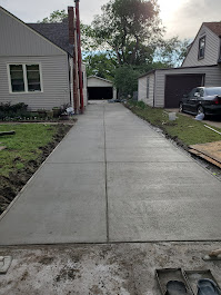 Finished concrete driveway by Agape Construction
